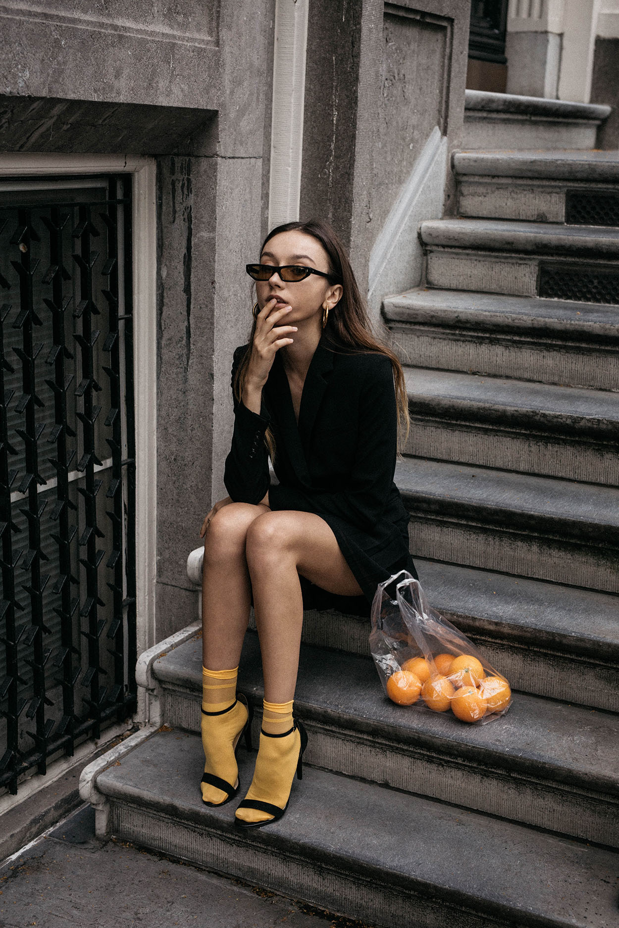bonceptual-editorial-balenciaga-2018-sunglasses-oranges-in-plastic-bag-bright-yellow-socks-with-sandals-trend-outfit-ideas-7